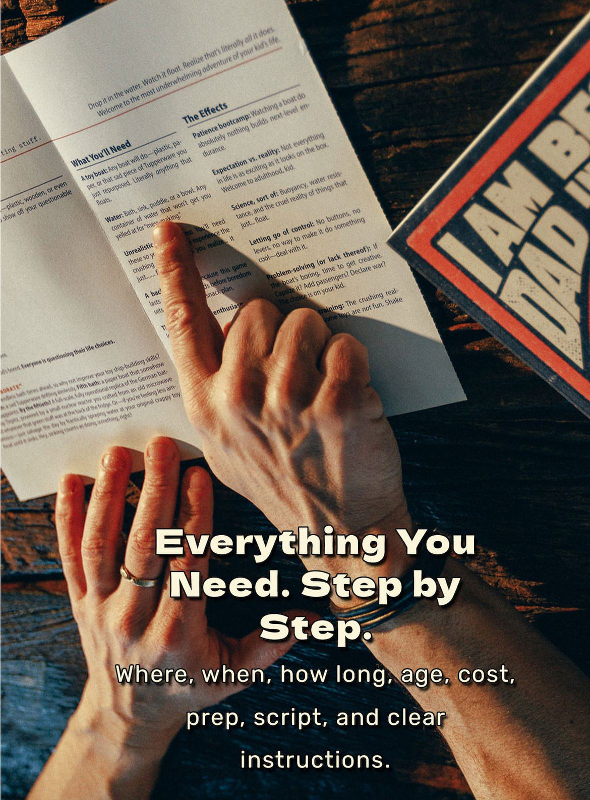 Hands point at a mission page on a wooden table: where, when, how long, age, cost, prep, script and instructions